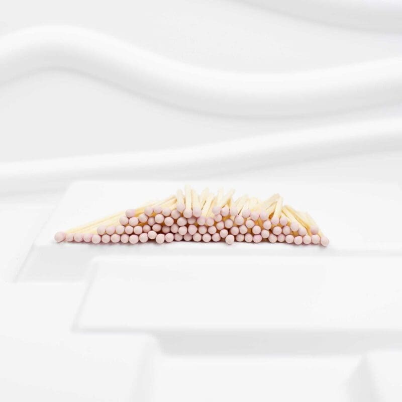 Stylish 7.5 cm wooden matches with pale pink heads, longer matches for candles, fireplaces, and fire pits as a decorative accessory or gift.